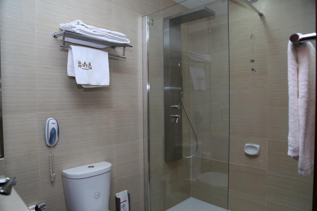 Hotel Huaxia Milano Habitación foto