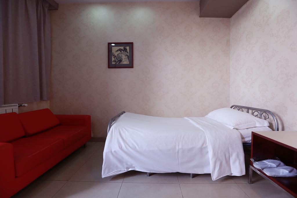 Hotel Huaxia Milano Habitación foto