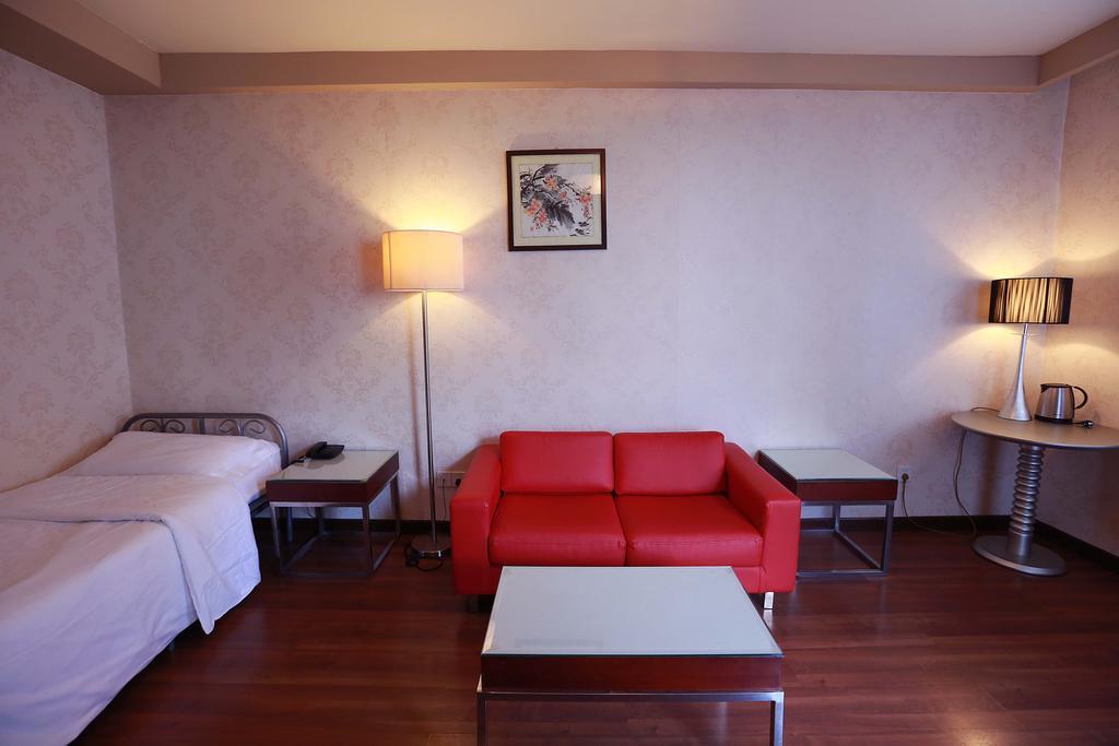 Hotel Huaxia Milano Habitación foto